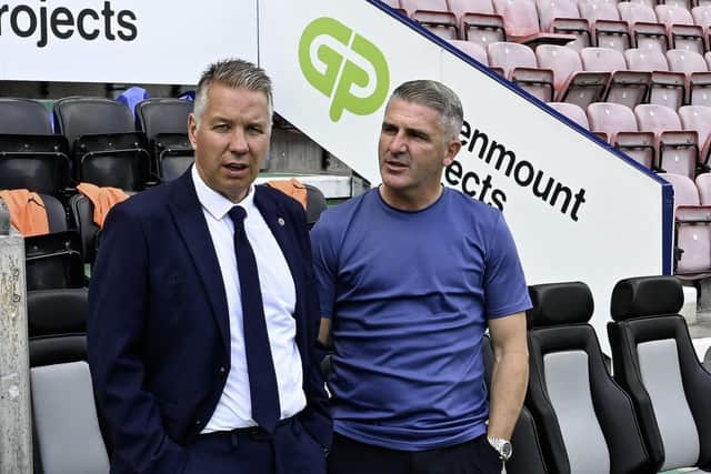 Posh boss Darren Ferguson (left) with Wigan manager Ryan Lowe before Saturday's League One game. Photo Bernard Platt.