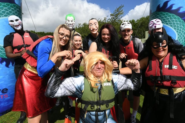 Dragon boat racing at the PCRC Rowing Course at Thorpe Meadows. Comic Heroes crew