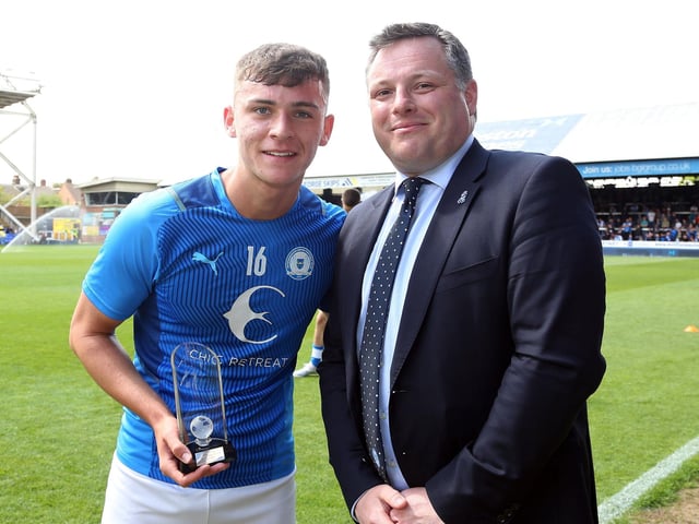 A role officially still occupied by one David Paton (pictured right with Harrison Burrows) even though his appointment led to Posh being charged with a breach of EFL regulations. Paton is currently absent from the club with his job now being handled by Leighton Mitchell on an interim basis. Posh expect the Paton affair to be resolved by Christmas, but they haven’t said which year...