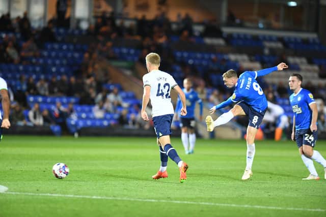 Posh midfielder Jack Taylor shoots at goal in the game against Spurs. Photo: David Lowndes,