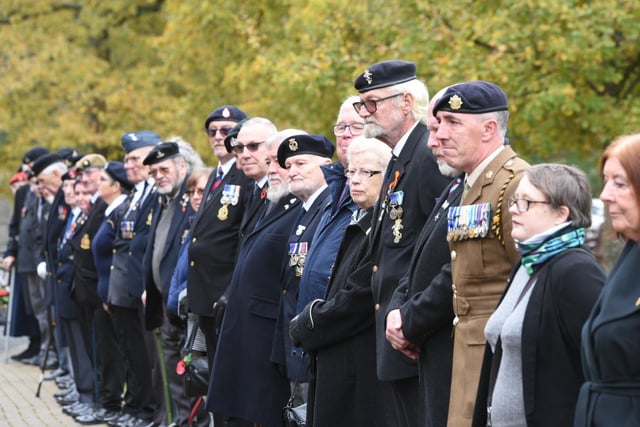 Many mourners wore medals to the service