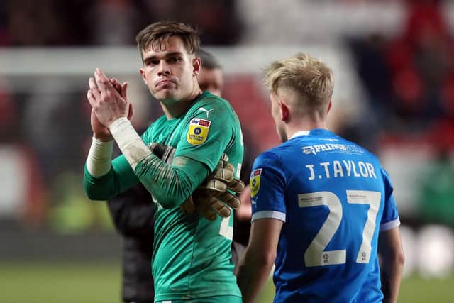 Will Blackmore applauds the Posh fans after his full Football League debut at Charlton last season. Photo: Joe Dent/theposh.com.