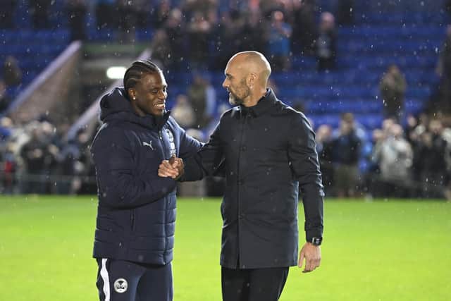 Peterborough United boss Luke Williams with Declan Frith. Photo: David Lonwdes.