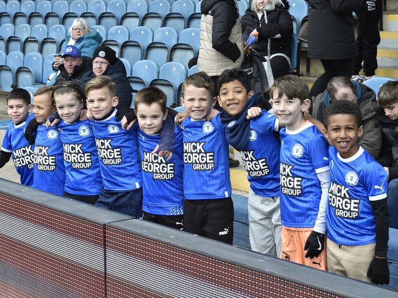 Peterborough United fans watch the disappointing defeat to Cheltenham Town.