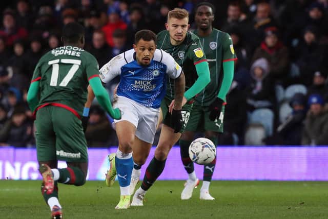 Jonson Clarke-Harris in action for Posh against Barnsley at London Road last season. Photo: Joe Dent/theposh.com.