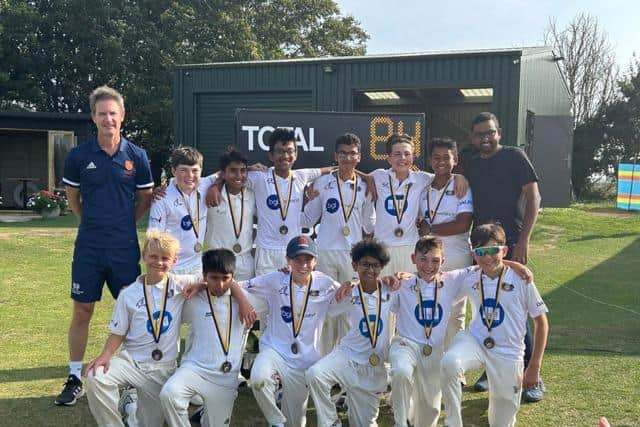Peterborough Town Under 13s celebrate their Hunts County Final hat-trick.
