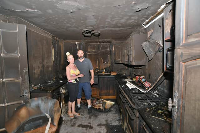 Eddie MacGregor and Esmeralda  at their home at Collingham, Orton Goldhay -  destroyed by fire following an  e-scooter battery fire