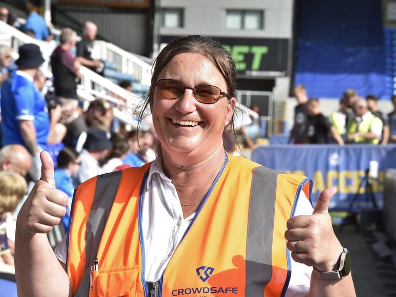 Peterborough United fans watch the draw with Leyton Orient.