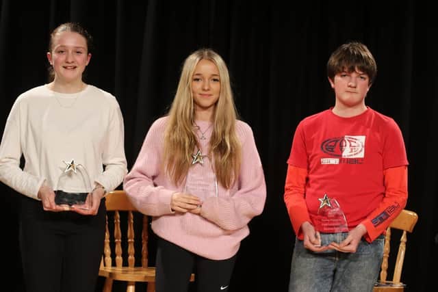 Young Fenland Poet Laureate winner Lacey Vinn (centre), with second place runner-up Nathanael Wilson (right) and third place runner-up Lydia Shillings (image: Tim Chapman)