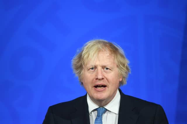 Prime Minister Boris Johnson gives a media briefing on coronavirus in Downing Street (Photo by Stefan Rousseau-WPA Pool/Getty Images)