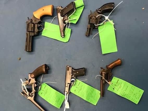 A selection of pistols including a Luger, Mauser, Browning and a Walther PPK