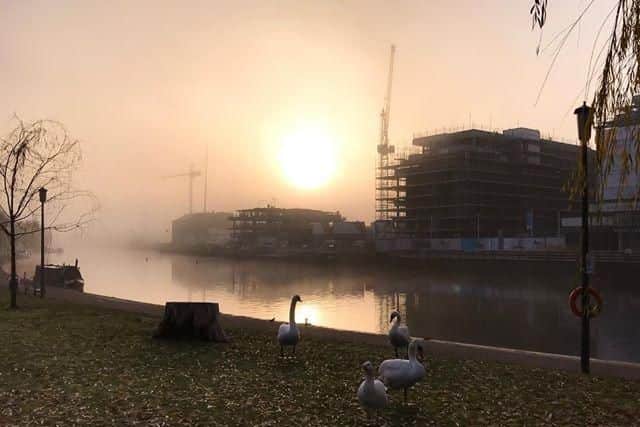 Alan Howe sent in this early morning view of Fletton Quays from the Embankment