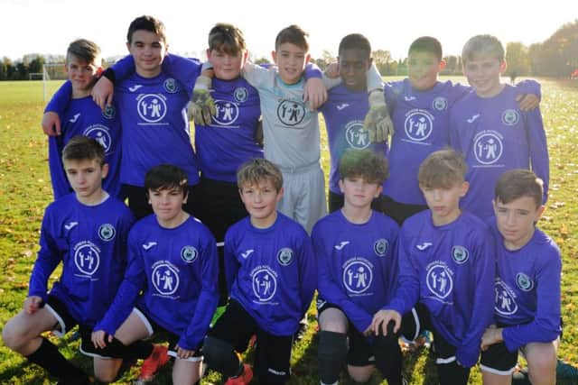 Riverside Under 13s are pictured before their 6-1 defeat by Feeder Soccer. From the left they are, back, Liam Coleman, Callum Ewers, Josh Duffy, Adam Darkin, Demi Sotanni, Luca Leone, Jack Walton, front, Gabriel Goymor, Jamie Moorehouse-Tupper, Harley Driscoll-Freeman, Daniel Richmond, Finlay Boothby and Joseph Reindel.