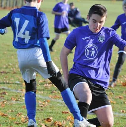 Action from tne game between Riverside FC Under 13s and  Feeder Soccer Under 13s.