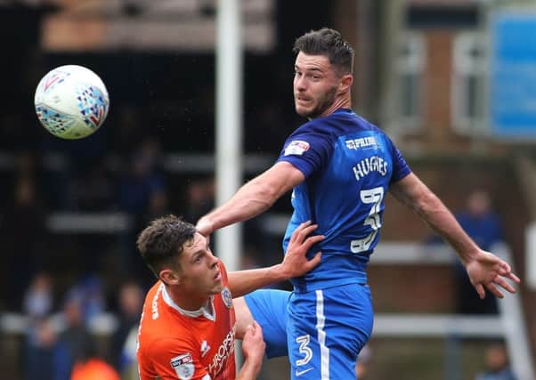 Andrew Hughes is expected to start for Posh at Rochdale.