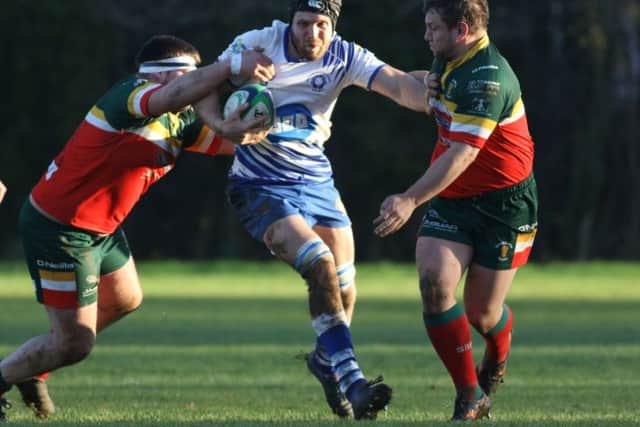 Sam Crooks on the run for the Lions against Sandbach. Picture: Mick Sutterby