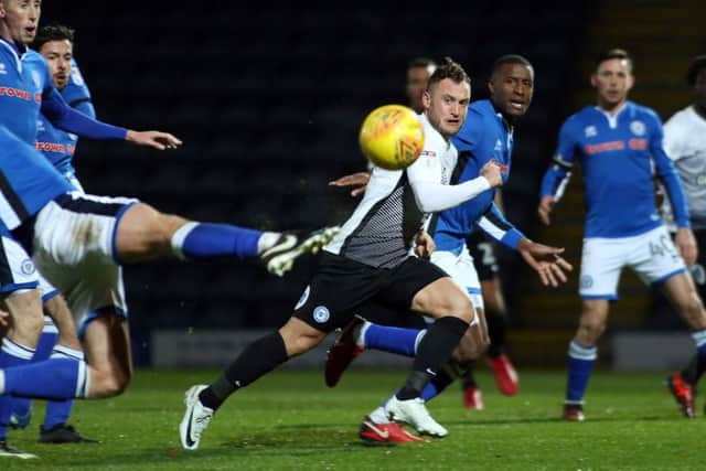 Posh substitute Ricky Miller keeps his eye on the ball at Rochdale. Photo: Joe Dent/theposh.com.