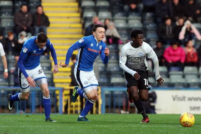 Leo Da Silva Lopes of Posh leaves Rochdale's Ollie Rtahbone and Joe Bunney in his wake. Photo: Joe Dent/theposh.com.
