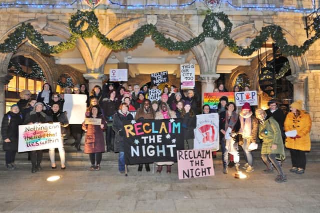 Reclaim the Night protestors walking through the City Centre, organised by Peterborough Rape Crisis. Walking with them was MP for Peterborough Fiona Onasanya EMN-171125-214031009