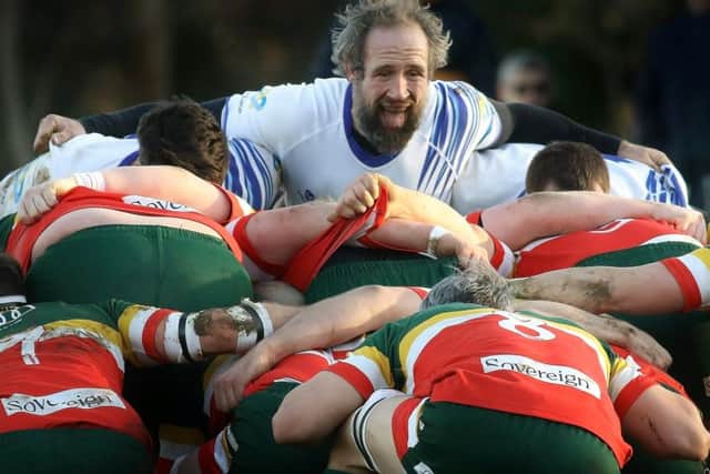 Lions hooker Wes Cope pops up in a scrum against Sandbach. Picture: Mick Sutterby