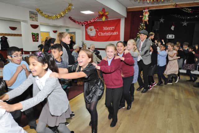 Children and Staff from Fulbridge Academy attending an "OAP's During the War" day at Parkway Scoial Club. EMN-171124-180641009