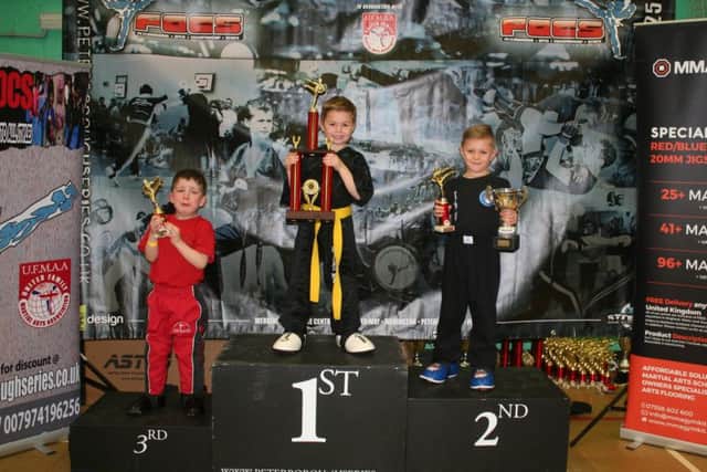 Joshua Leonard on top of the podium.