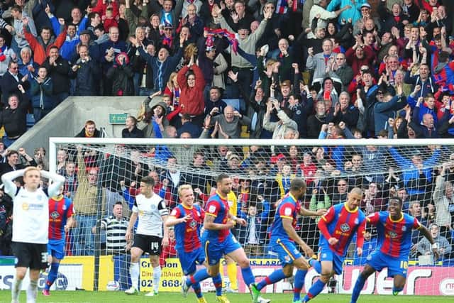 Kevin Phillips has just scored for Crystal Palace against Posh in May 2013.