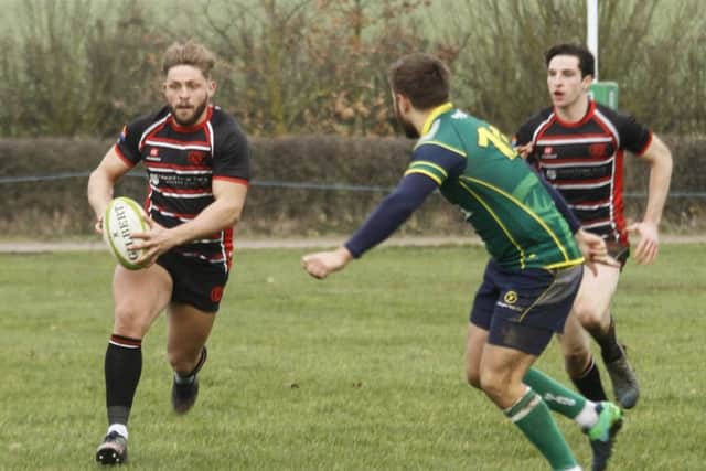 Will Carrington on the attack for Oundle against Huntingdon. He scored two tries. Picture: Mark Shore