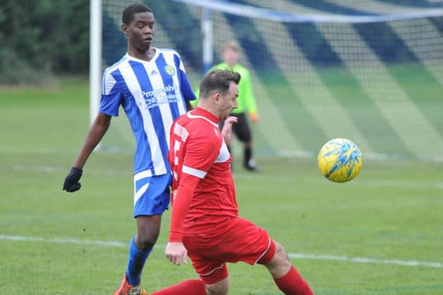 PFA Senior Cup action from Peterborough Polonia (red) and Peterborough Sports Reserves. Photo: David Lowndes.