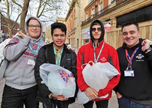 Daniel Duell, Jeremicko Onrubia, Dylan Healy and Dean Boyall from Cambs Regional College (Hunts Campus Prince's Trust) handing out clothes etc to homeless in Peterborough EMN-171129-141203009