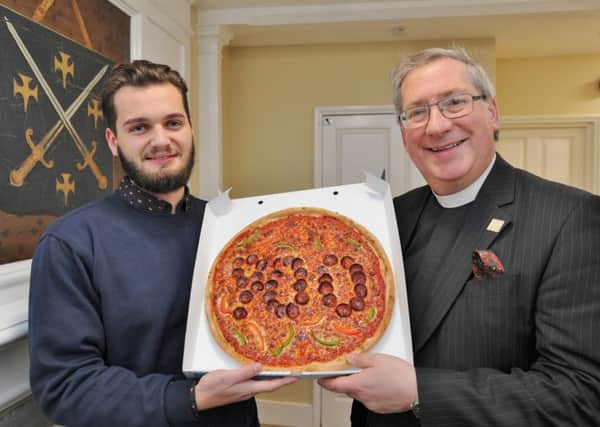 Launch of the Peterborough Cathedral 900 celebtrations. Tim Alban Jones, Acting Dean of Peterborough Cathedral with Pietro Scibella with the Dial-a-Pizza 900 pizza EMN-170512-183421009