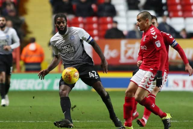 Anthony Grant (left) has been a relevation for Posh this season.