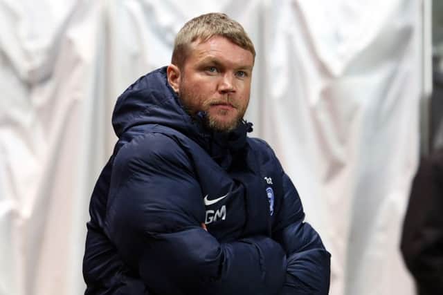 Posh fans give their views on manager Grant McCann.