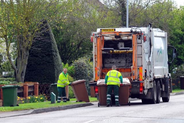 Brown bins being collected in Werrington, Peterborough  EMN-140904-085451001
