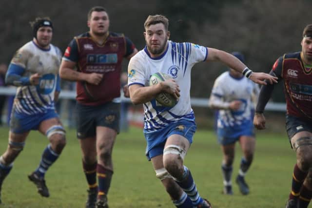 Tom Lewis scores a try for the Lions against Bournville. Picture: Mick Sutterby