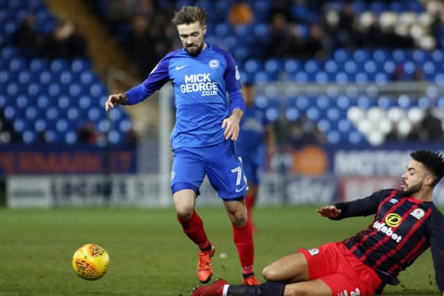 Gwion Edwards of Peterborough United in action with Derrick Williams of Blackburn Rovers - Mandatory by-line: Joe Dent/JMP - 09/12/2017 - FOOTBALL - ABAX Stadium - Peterborough, England - Peterborough United v Blackburn Rovers - Sky Bet League One