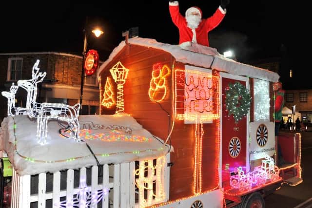 The annual Whittlesey Extravaganza on the Market Place. Whittlesey Round Table Christmas float EMN-170812-192758009