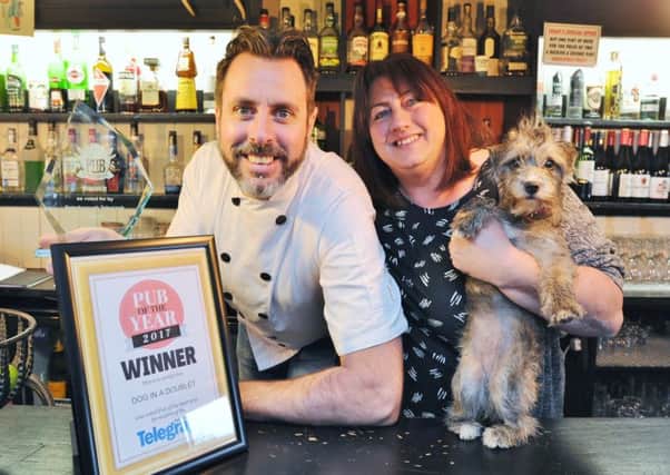 Peterborough Telegraph Pub of the Year awards winners  John and Della McGinn, owners of the Dog in a Doublet pub near Whittlesey EMN-171112-152213009