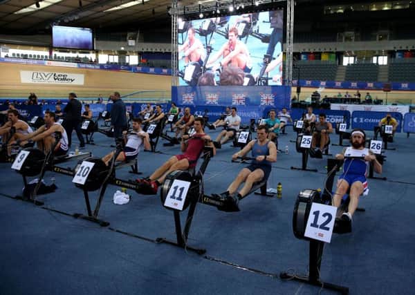 Sir Bradley Wiggins (right) pictured at the British Indoor Rowing Championships. Picture:  Steven Paston/PA Wire