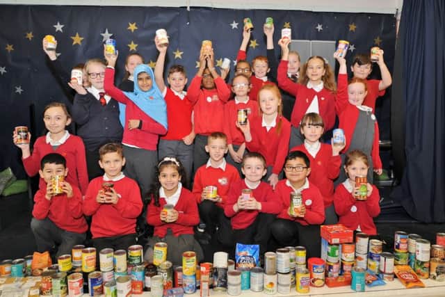 The school council from Highlees primary school with their collection for a Christmas food bank. EMN-170812-192346009