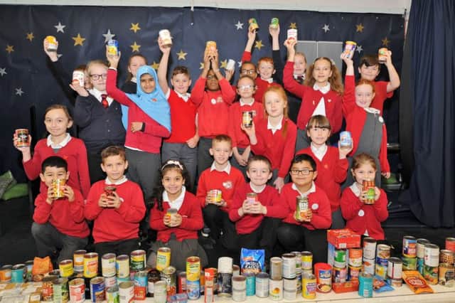 The school council from Highlees primary school with their collection for a Christmas food bank. EMN-170812-192346009