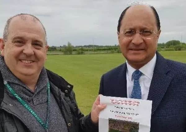 Cllr Ray Bisby and Shailesh Vara near the site of the planned farm