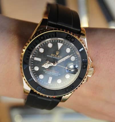 Fake: A counterfeit Rolex seized as part of the investigation