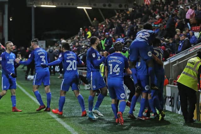 Posh players celeberate  after the winning goal at Fleetwood. Photo: Joe Dent/theposh.com.