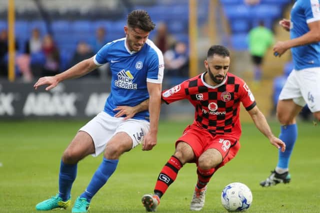 Action from Posh v Walsall last season.