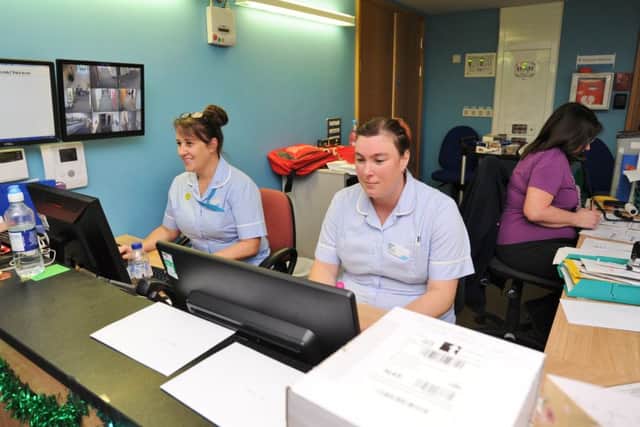 Staff working over Christmas at Sue Ryder, Thorpe Hall.  Nursing assistants Angela Irvine and Dawn Rex at the nursing station EMN-171218-230547009