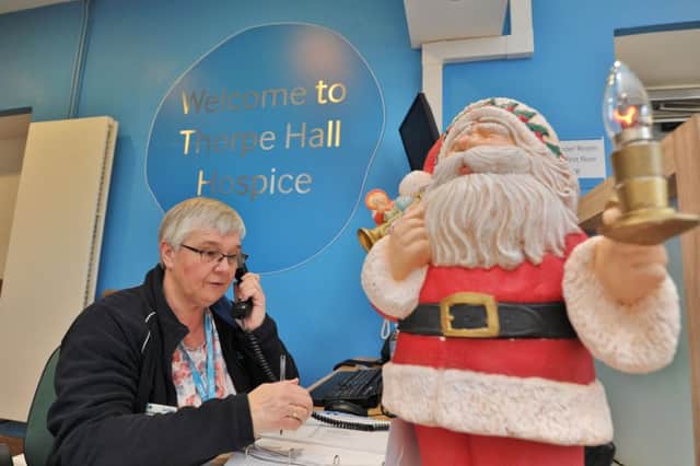 Staff working over Christmas at Sue Ryder, Thorpe Hall.  Receptionist  Lesley Jackson EMN-171218-230609009
