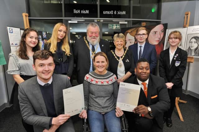 Tom Nash and Joshua Bookal with felllow students at the Jack Hunt speechday presentation with guest speaker Claire Lomas and Mayor of Peterborough Coun. John Fox and Mayoress Judy Fox EMN-171218-230642009
