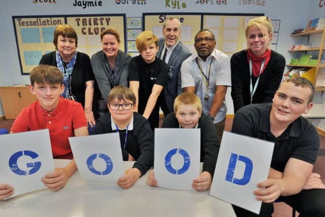 nenegate School students Alfie Law, Sean Myburgh, Aironas Kveskevicius (back) Jakob Johnstone and Jamie Turner with staff and govenors celebrate their Good OFSTED EMN-171219-161837009