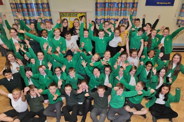 Year 6 pupils at Eye C of E Primary school celebrate3 their school's top ranking in the city schools league table. EMN-171219-161824009